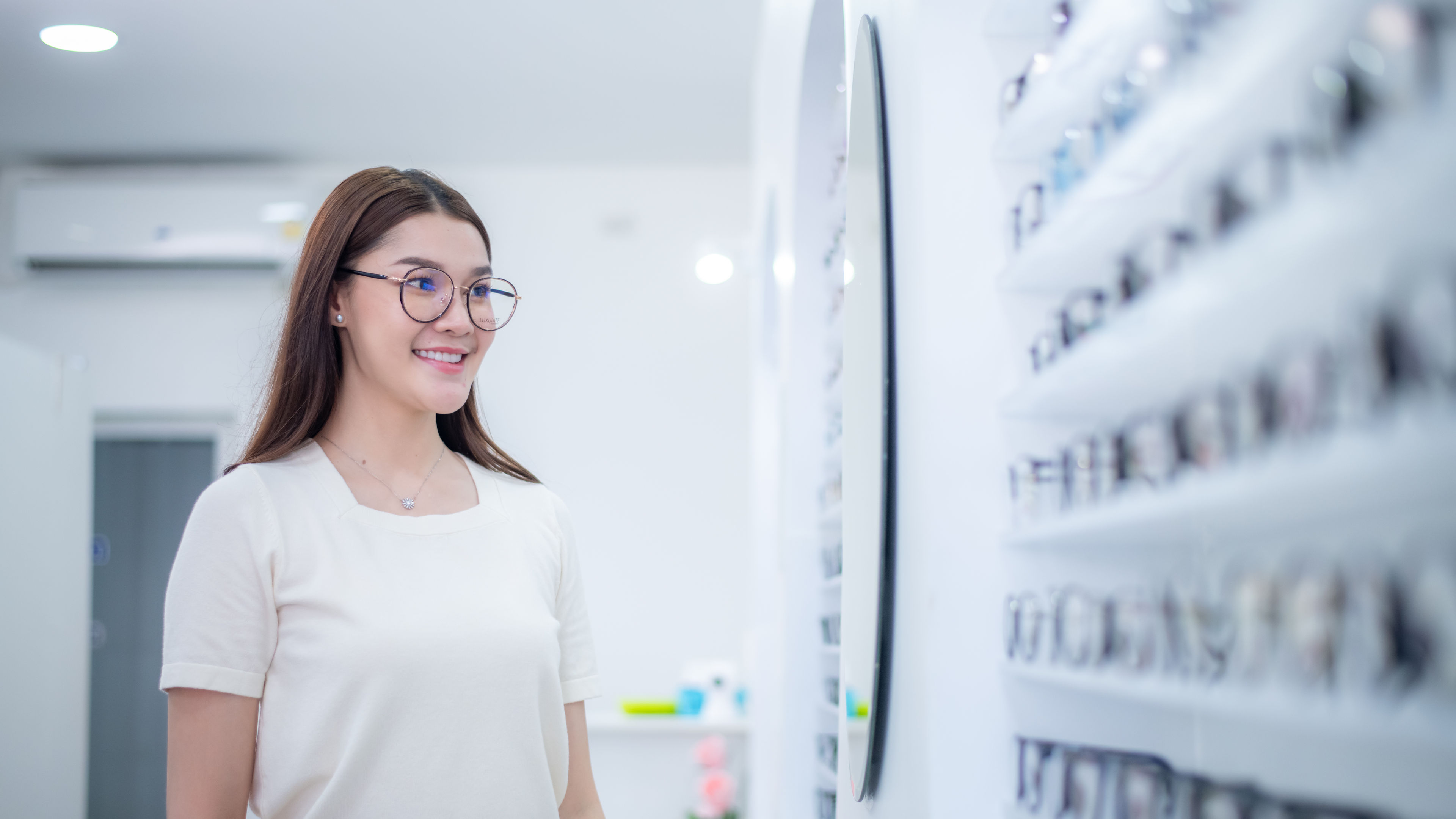 Asian woman is selecting eyewear