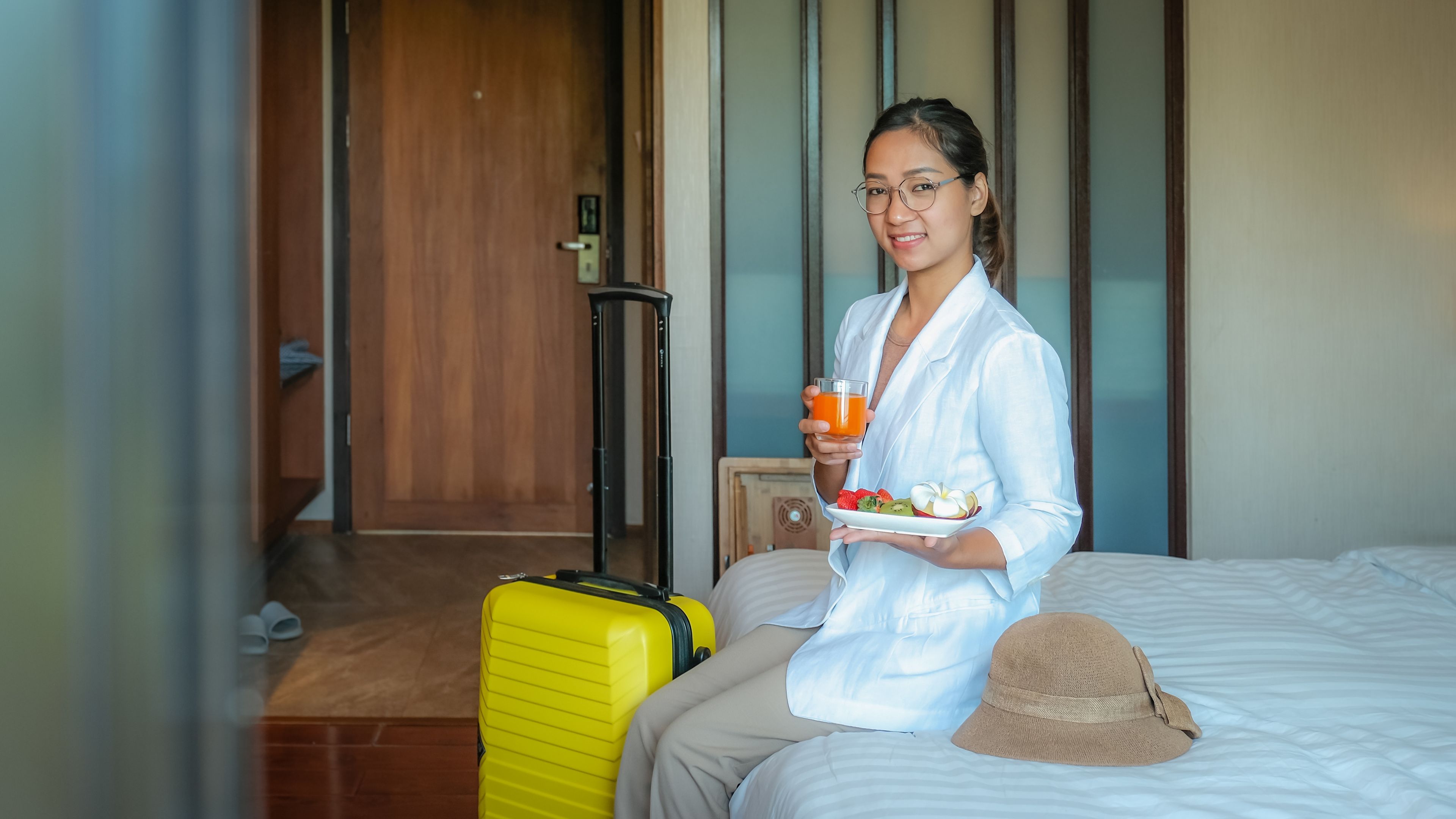 businesswoman eating fruits and drink orange juice