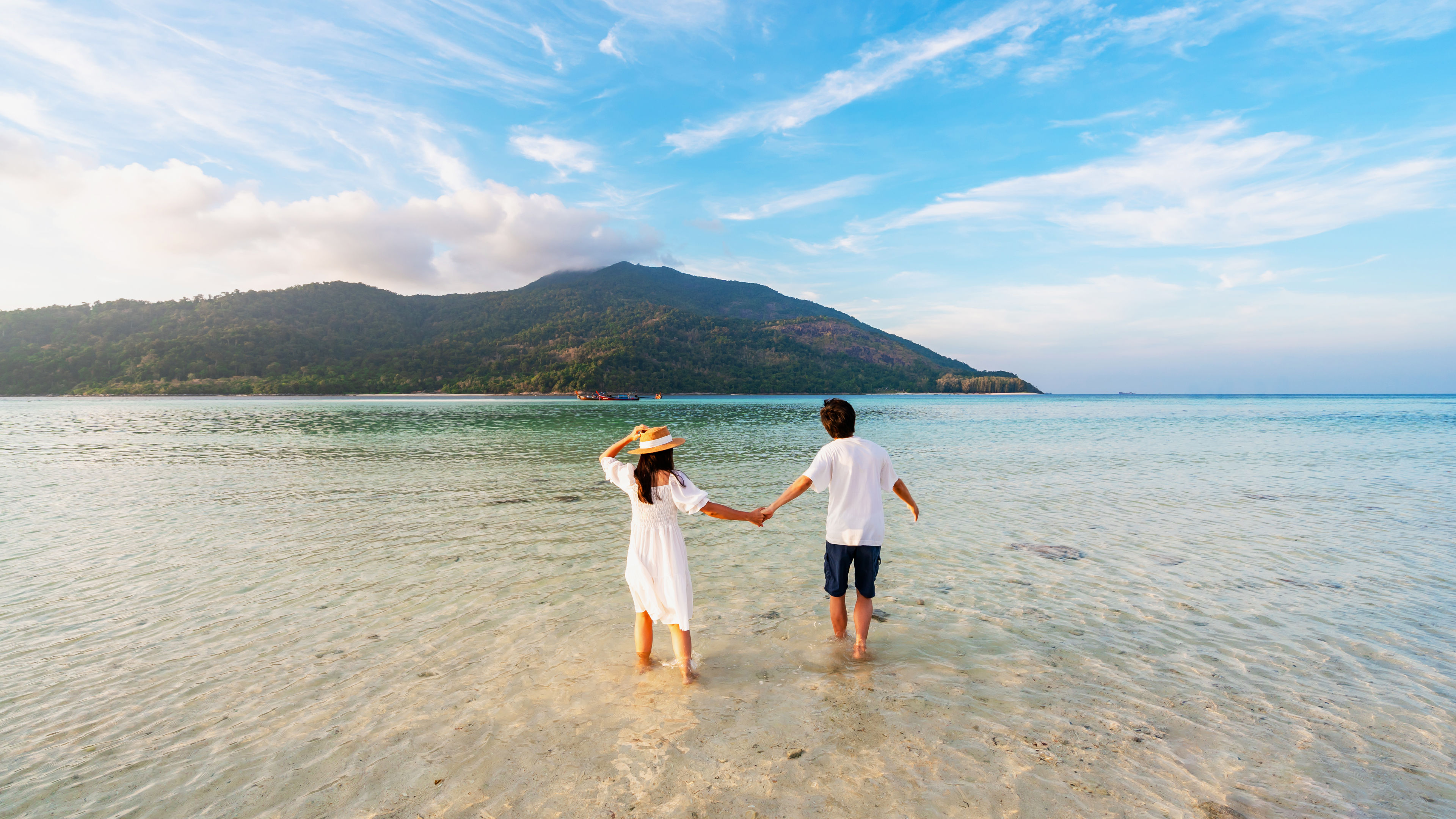 Image of a couple enjoying at the beach 