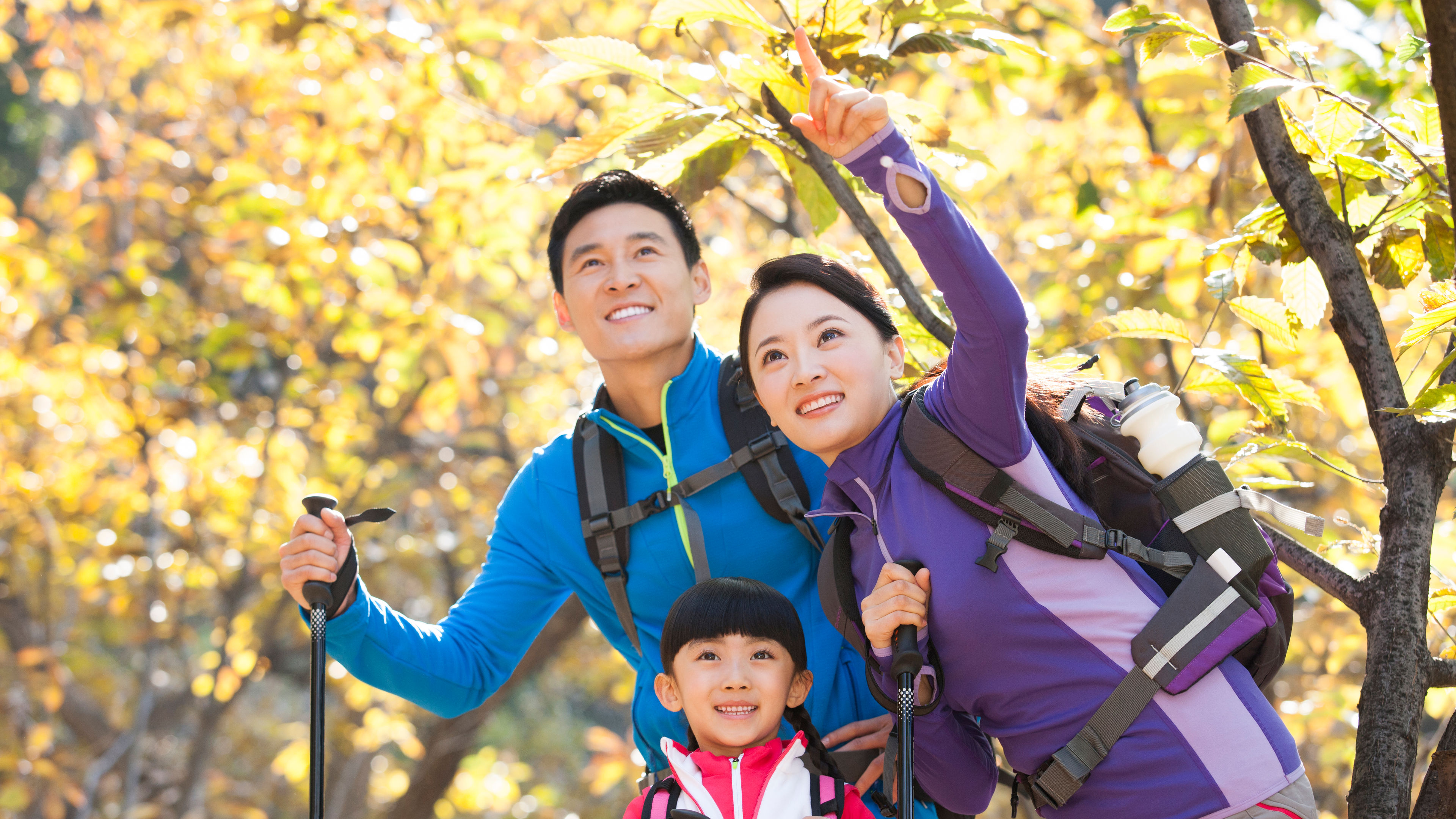 Happy family hiking