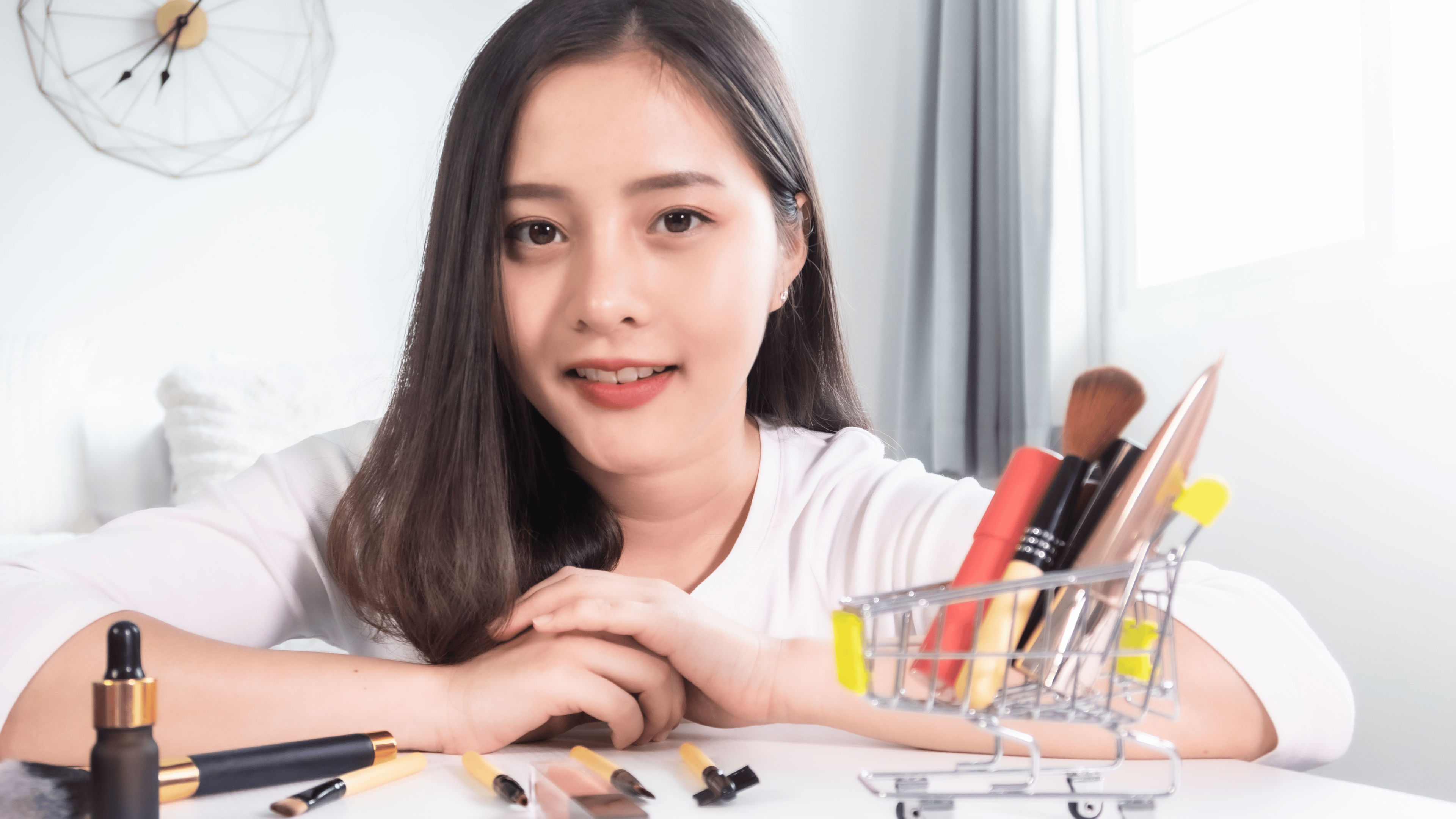 Picture of a lady with make up products 