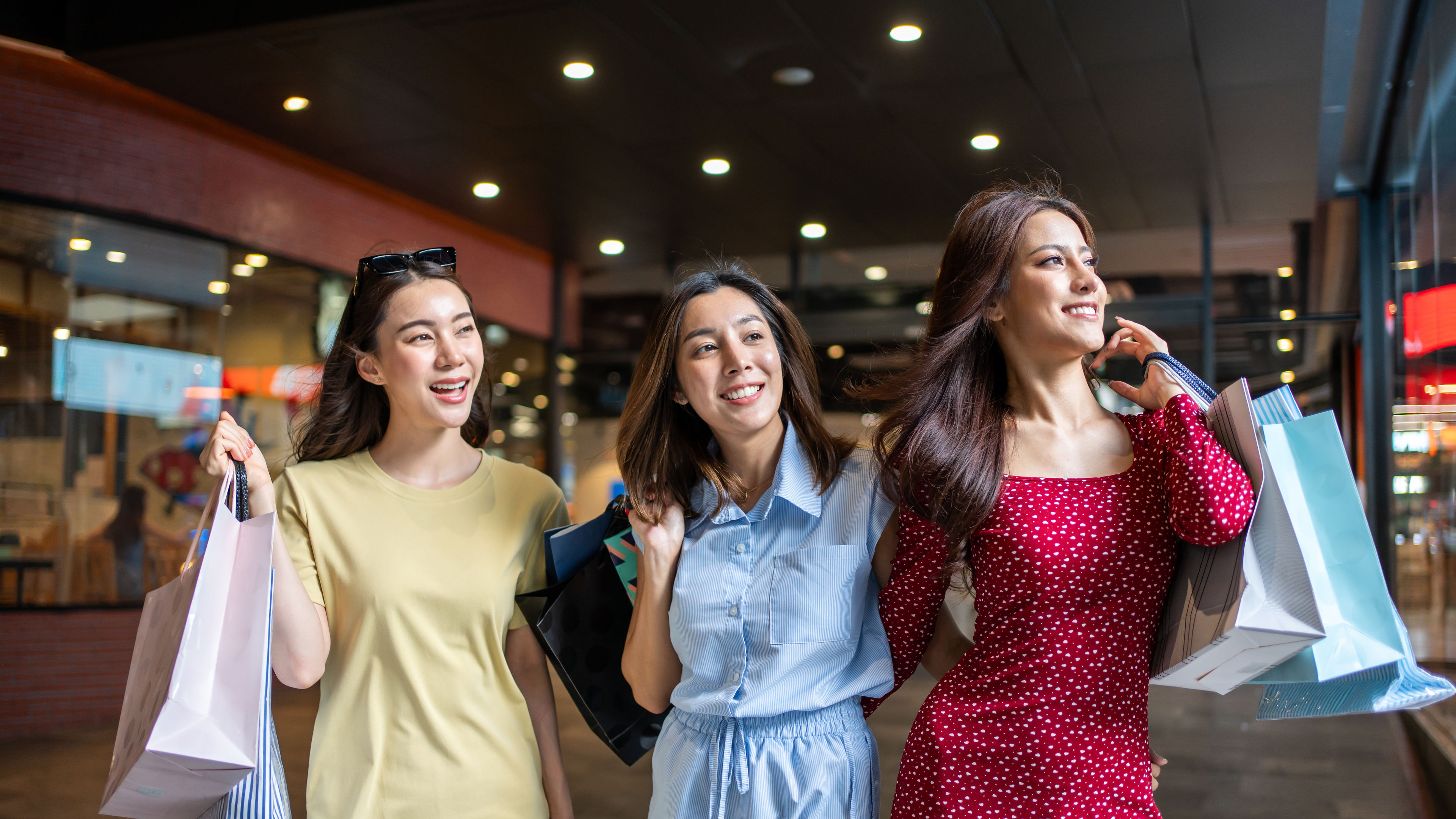 Three women shopping