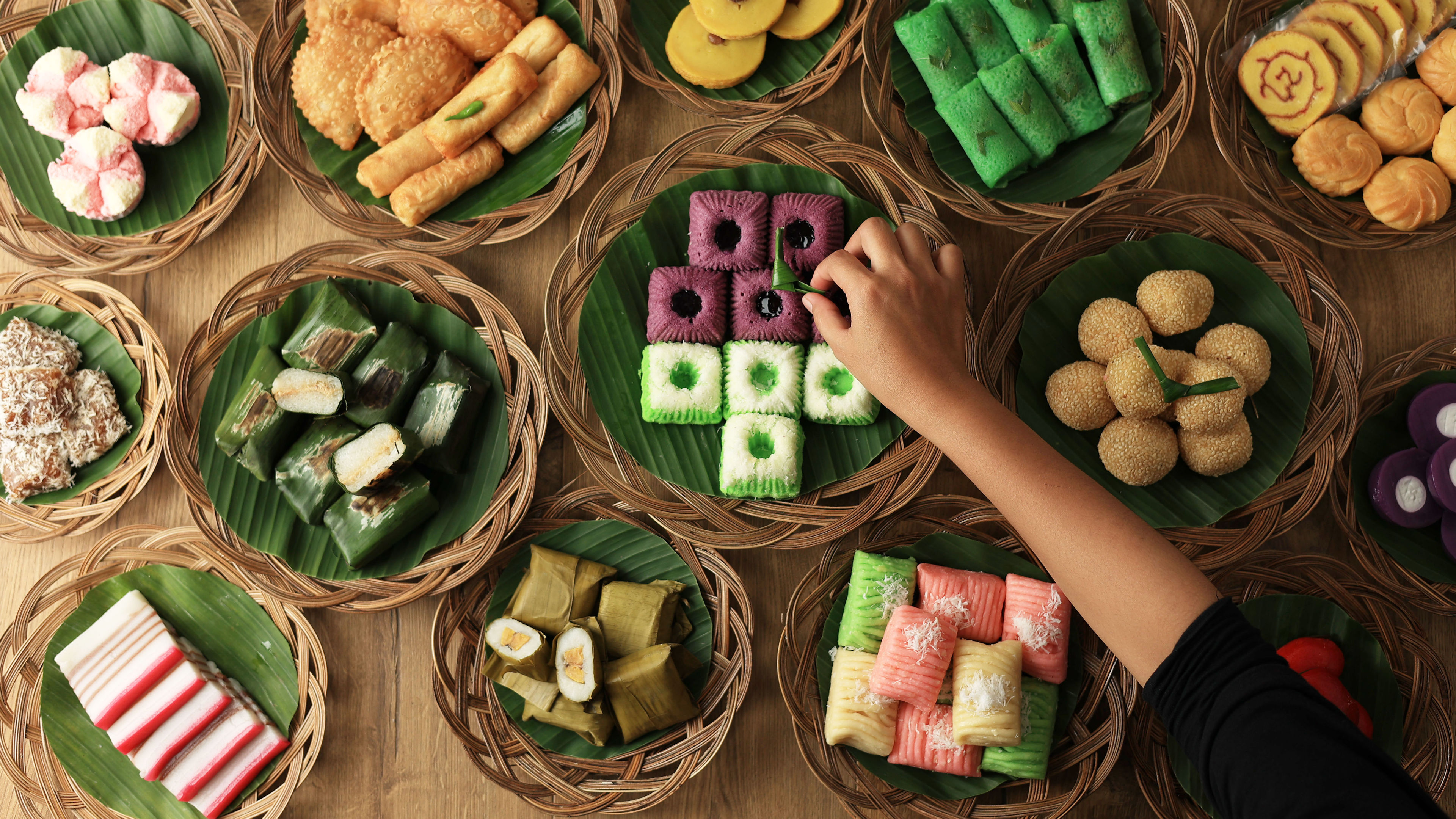 Various colourful desserts placed on a table 